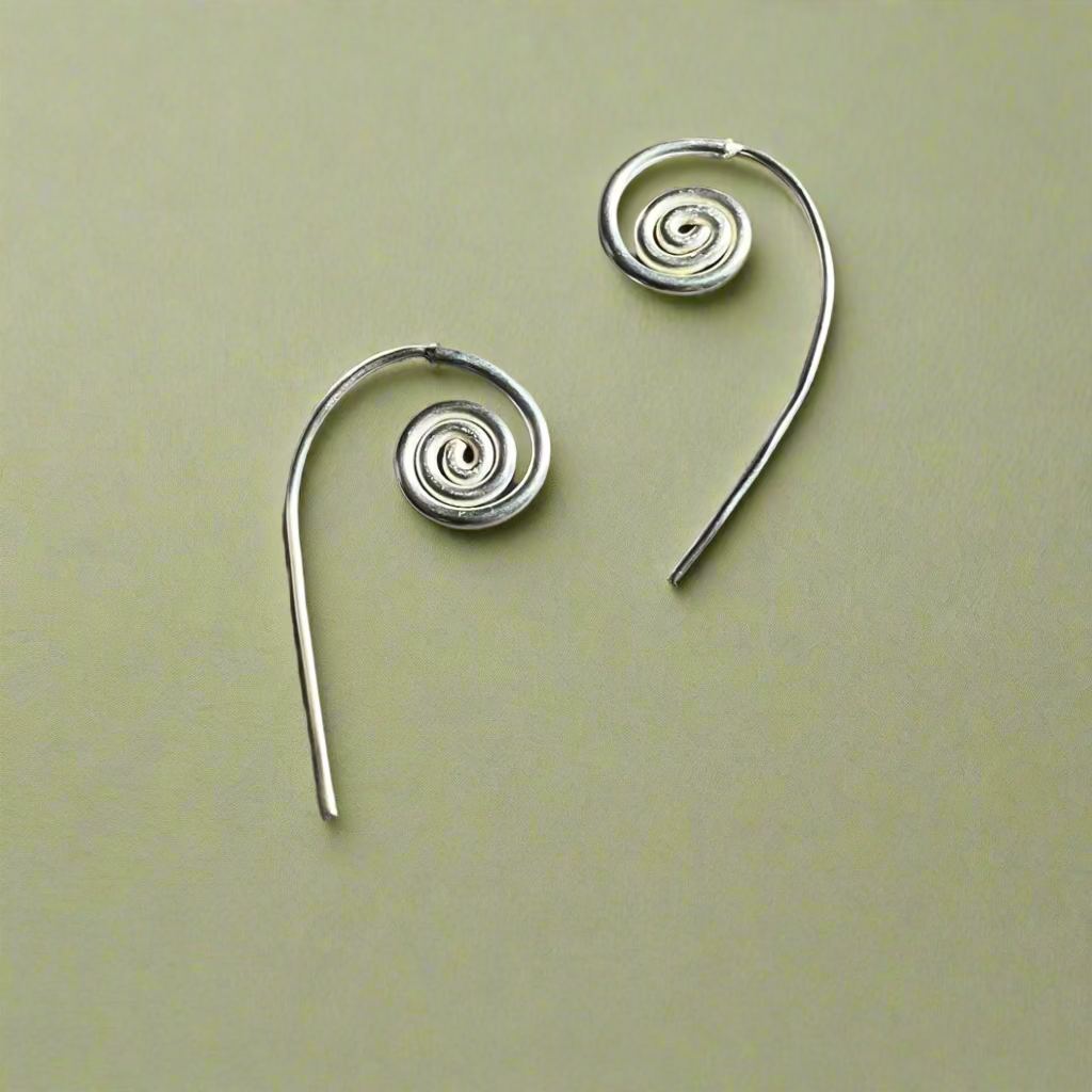 Dangle silver earrings with a spiral like a fiddlehead 